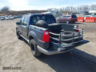 2003 Ford Explorer Sport Trac XLS with VIN 1FMZU77E83UA73034, listed as a IAAI auction lot 41841028 with 191,370 mi miles. Bid and sale history available at carsss.com. Image 3.