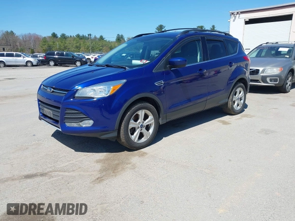 2016 Ford Escape SE with VIN 1FMCU9GX1GUB28870, listed as a IAAI auction lot 42129628 with 113,909 mi miles. Bid and sale history available at carsss.com. Image 2.