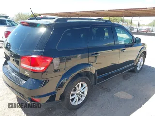 2015 Dodge Journey SXT with VIN 3C4PDCBG3FT678686, listed as a IAAI auction lot 42101541 with 185,514 mi miles and . Bid and sale history available at DreamBid. Image 4.