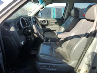 2007 Honda Ridgeline RTL w/Leather with VIN 2HJYK165X7H500660, listed as a Copart auction lot 69111204 with 206,943 mi miles and Salvage Title. Bid and sale history available at carsss.com. Image 7.