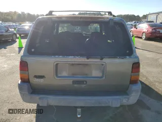 1997 Jeep Grand Cherokee TSi with VIN 1J4FX58S4VC516340, listed as a Copart auction lot 84409044 with 256,300 mi miles and Clean Title. Bid and sale history available at carsss.com. Image 6.