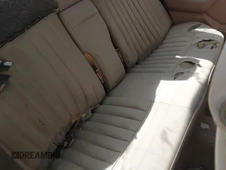 1987 Mercedes-Benz 300 with VIN WDBEA30DXHA466708, listed as a IAAI auction lot 41518078 with 166,202 mi miles. Bid and sale history available at carsss.com. Image 8.