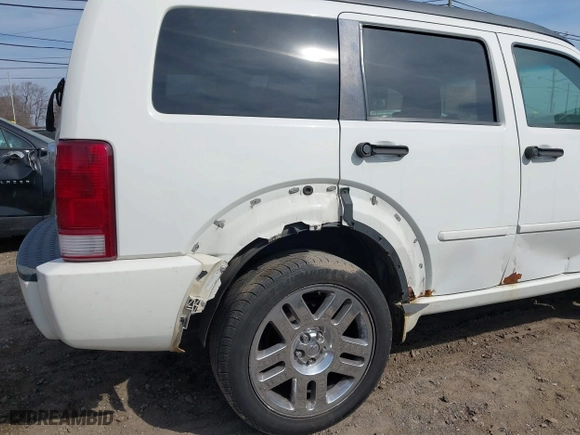 2007 Dodge Nitro R/T with VIN 1D8GU58687W720700, listed as a IAAI auction lot 41802485 with 203,575 mi miles. Bid and sale history available at carsss.com. Image 6.