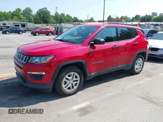 2018 Jeep Compass Sport with VIN 3C4NJCABXJT308768, listed as a IAAI auction lot 42420499 with 84,285 mi miles and . Bid and sale history available at DreamBid. Image 2.