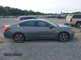 2016 Nissan Altima SR with VIN 1N4AL3AP2GC220196, listed as a IAAI auction lot 42362704 with 104,939 mi miles and . Bid and sale history available at DreamBid. Image 13.