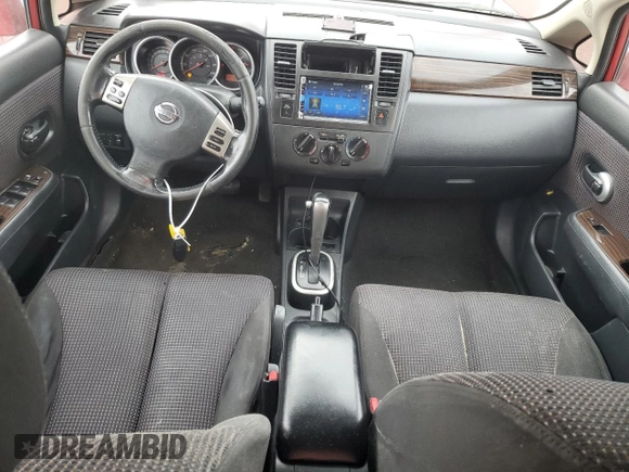 2010 Nissan Versa 1.8 S with VIN 3N1BC1AP4AL371722, listed as a Copart auction lot 72641144 with 128,445 mi miles and Salvage Title. Bid and sale history available at carsss.com. Image 8.