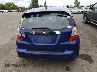 2009 Honda Fit Sport z VIN JHMGE88419S039797, wystawiony jako Copart lot #56866245 z przebiegiem 162 896 mil mil oraz Szkoda całkowita • Salvage title. Historia ofert i sprzedaży dostępna na DreamBid. Obrazek 6.