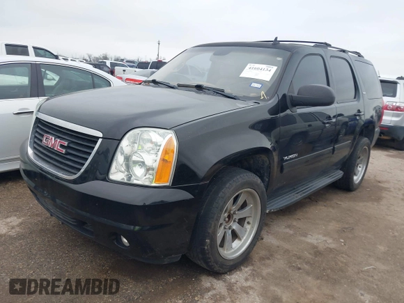 2014 GMC Yukon SLT with VIN 1GKS1CE02ER207447, listed as a IAAI auction lot 41604134 with 199,417 mi miles. Bid and sale history available at carsss.com. Image 2.