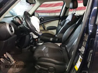 2012 MINI Countryman S with VIN WMWZC5C57CWM14796, listed as a Copart auction lot 43021345 with 178,183 mi miles and Salvage Title. Bid and sale history available at DreamBid. Image 7.