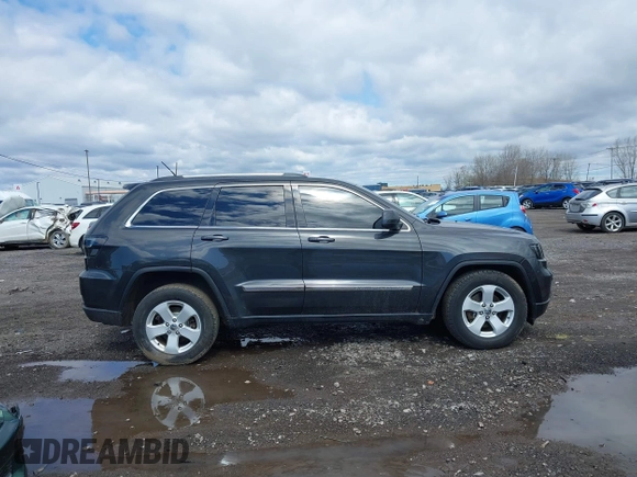 2011 Jeep Grand Cherokee Laredo with VIN 1J4RR4GG9BC723395, listed as a IAAI auction lot 42092022 with 86,226 mi miles and . Bid and sale history available at DreamBid. Image 13.