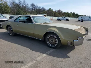 1967 Oldsmobile Toronado with VIN 396877M621130, listed as a Copart auction lot 71016094 with 17,887 mi miles and Salvage Title. Bid and sale history available at DreamBid. Image 4.