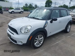 2014 MINI Countryman S z VIN WMWZC5C57EWP38396, wystawiony jako IAAI lot #42400771 z przebiegiem 147 302 mil mil oraz . Historia ofert i sprzedaży dostępna na DreamBid. Obrazek 2.
