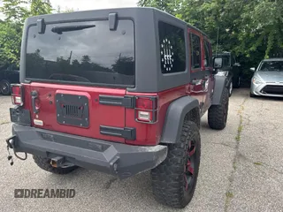 2012 Jeep Wrangler Unlimited Sport with VIN 1C4BJWDG5CL289329, listed as a Copart auction lot 65816775 with 152,632 mi miles and Clean title. Bid and sale history available at DreamBid. Image 4.