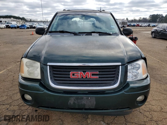 2004 GMC Envoy SLE with VIN 1GKDS13SX42234675, listed as a Copart auction lot 48780955 with 217,790 mi miles and Salvage Title. Bid and sale history available at carsss.com. Image 5.