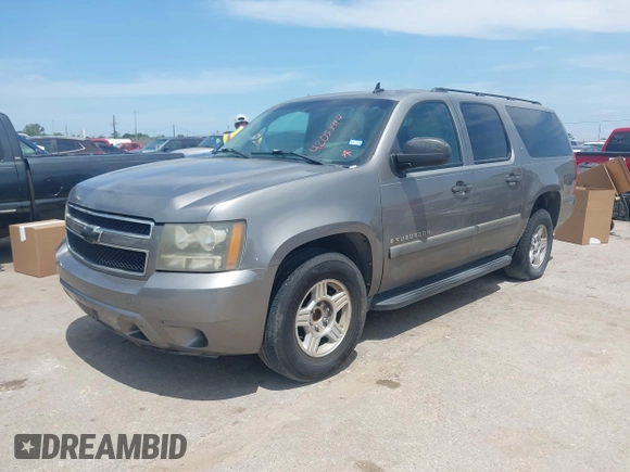 2007 Chevrolet Suburban LTZ with VIN 3GNFC16047G302161, listed as a IAAI auction lot 42053997 with 173,922 mi miles. Bid and sale history available at carsss.com. Image 2.