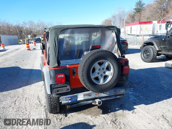 2006 Jeep Wrangler SE with VIN 1J4FA29S16P712101, listed as a IAAI auction lot 41347042 with 129,063 mi miles. Bid and sale history available at carsss.com. Image 16.