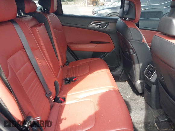 2023 Kia Sportage SX-Prestige with VIN KNDPXCAG1P7020251, listed as a IAAI auction lot 42364221 with 129,885 mi miles and . Bid and sale history available at DreamBid. Image 8.