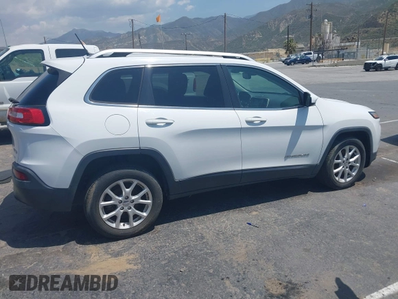 2015 Jeep Cherokee Latitude with VIN 1C4PJLCB7FW790865, listed as a IAAI auction lot 42182034 with 161,642 mi miles and . Bid and sale history available at carsss.com. Image 13.
