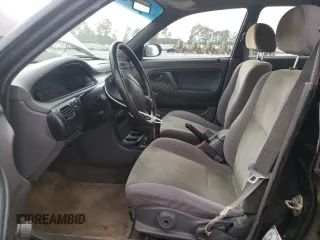 1996 Mazda 626 z VIN 1YVGE22C2T5585359, wystawiony jako Copart lot #74568444 z przebiegiem 159 922 mil mil oraz Szkody całkowita. Historia ofert i sprzedaży dostępna na DreamBid. Obrazek 7.