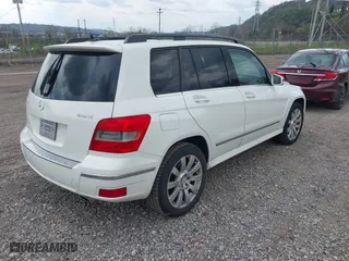 2012 Mercedes-Benz GLK-Class GLK 350 with VIN WDCGG8HB4CF863801, listed as a IAAI auction lot 42000502 with 268,732 mi miles. Bid and sale history available at carsss.com. Image 4.