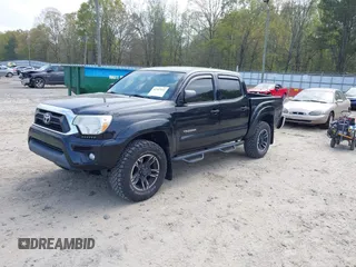 2014 Toyota Tacoma PreRunner with VIN 5TFJU4GN7EX061460, listed as a IAAI auction lot 41947252 with 135,543 mi miles and . Bid and sale history available at DreamBid. Image 2.