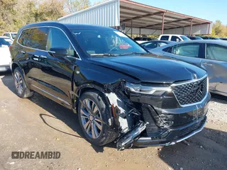 2025 Cadillac XT6 FWD Premium Luxury with VIN 1GYKPCRS1SZ118772, listed as a IAAI auction lot 41048190 with 131 mi miles. Bid and sale history available at carsss.com. Image 1.