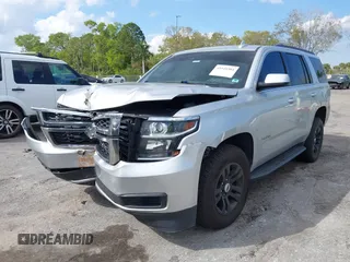 2018 Chevrolet Tahoe LT with VIN 1GNSCBKCXJR367852, listed as a IAAI auction lot 41549304 with 151,684 mi miles and . Bid and sale history available at DreamBid. Image 12.