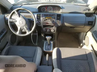 2006 Nissan X-Trail XE z VIN JN8BT08V86W215099, wystawiony jako Copart lot #64736564 z przebiegiem 282 753 mil mil oraz Szkody całkowita. Historia ofert i sprzedaży dostępna na DreamBid. Obrazek 8.