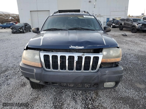 1999 Jeep Grand Cherokee Laredo with VIN 1J4GW58N6XC784679, listed as a Copart auction lot 85345304 with 234,584 mi miles and Salvage Title. Bid and sale history available at carsss.com. Image 5.