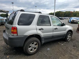2006 Ford Escape XLT with VIN 1FMYU93156KD49857, listed as a Copart auction lot 73610184 with 123,339 mi miles and Salvage Title. Bid and sale history available at carsss.com. Image 3.