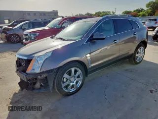 2012 Cadillac SRX Premium Collection z VIN 3GYFNCE32CS530669, wystawiony jako Copart lot #64673355 z przebiegiem Nie podano mil oraz Szkoda całkowita • Salvage title. Historia ofert i sprzedaży dostępna na DreamBid. Obrazek 1.