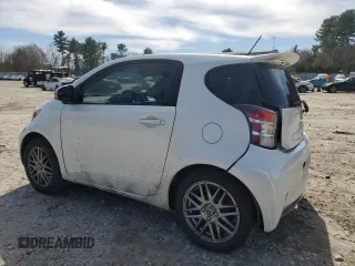 2012 Scion iQ with VIN JTNJJXB03CJ011933, listed as a Copart auction lot 52923385 with 137,836 mi miles and Clean Title. Bid and sale history available at carsss.com. Image 2.