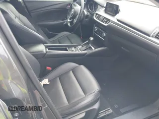2017 Mazda 6 Touring with VIN JM1GL1V57H1127804, listed as a IAAI auction lot 41515342 with 107,336 mi miles and . Bid and sale history available at carsss.com. Image 5.