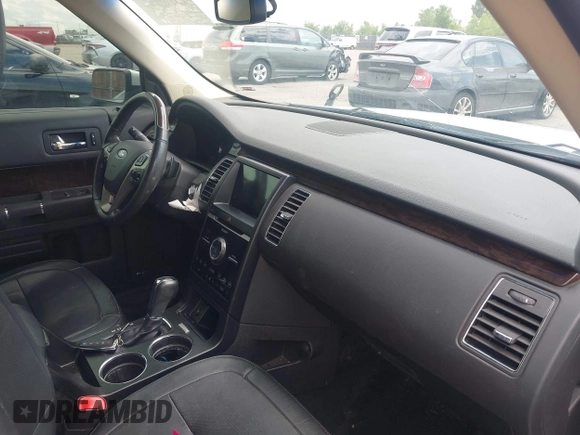 2016 Ford Flex Limited z VIN 2FMHK6DT8GBA18903, wystawiony jako IAAI lot #42460131 z przebiegiem 114 165 mil mil oraz . Historia ofert i sprzedaży dostępna na DreamBid. Obrazek 5.