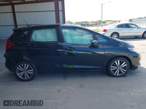 2015 Honda Fit EX-L with VIN 3HGGK5H82FM706622, listed as a IAAI auction lot 41767389 with 95,670 mi miles. Bid and sale history available at carsss.com. Image 12.