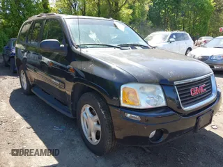 2005 GMC Envoy SLE z VIN 1GKDT13S452198027, wystawiony jako IAAI lot #42243258 z przebiegiem 144 240 mil mil oraz . Historia ofert i sprzedaży dostępna na DreamBid. Obrazek 1.