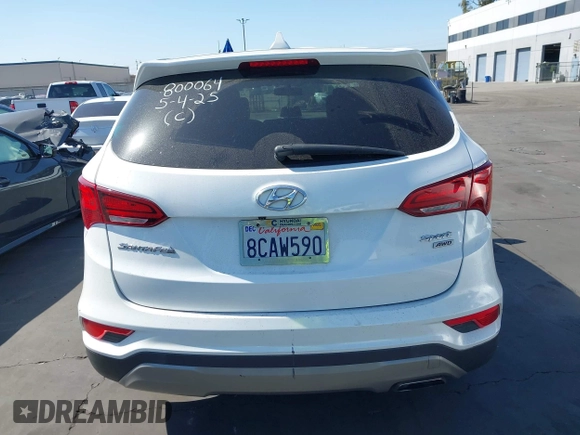 2017 Hyundai Santa Fe 2.4L z VIN 5XYZTDLB0HG403842, wystawiony jako IAAI lot #42206543 z przebiegiem 77 900 mil mil oraz . Historia ofert i sprzedaży dostępna na DreamBid. Obrazek 17.