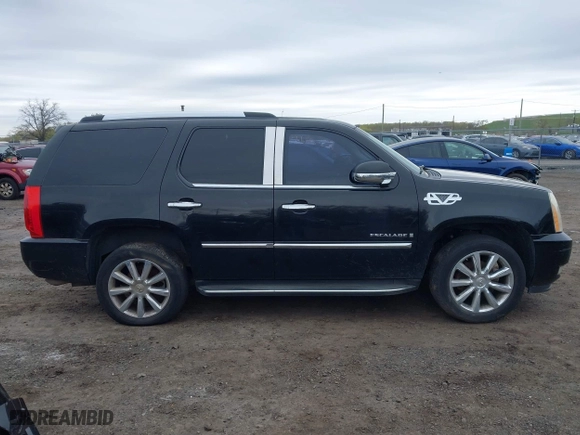 2009 Cadillac Escalade with VIN 1GYFK23219R102455, listed as a IAAI auction lot 42094042 with 238,407 mi miles. Bid and sale history available at carsss.com. Image 14.