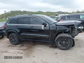 2017 Jeep Grand Cherokee Laredo with VIN 1C4RJFAG2HC649408, listed as a IAAI auction lot 42072440 with 58,818 mi miles and . Bid and sale history available at DreamBid. Image 13.