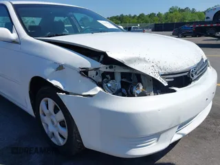 2006 Toyota Camry STD with VIN 4T1BE32KX6U734944, listed as a IAAI auction lot 42006245 with 243,967 mi miles. Bid and sale history available at carsss.com. Image 12.