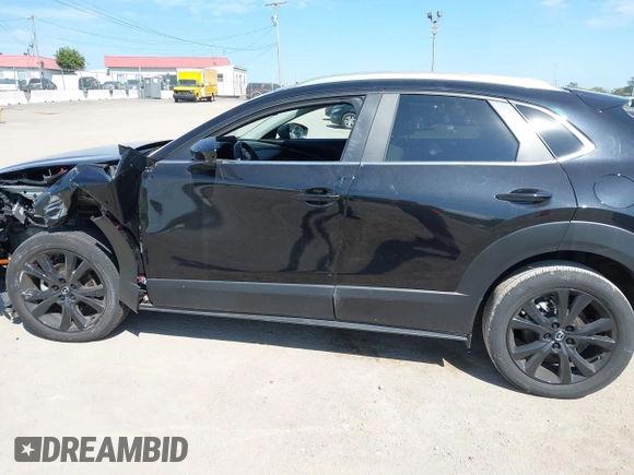 2022 Mazda CX-30 2.5 Turbo with VIN 3MVDMBAY4NM452705, listed as a IAAI auction lot 40101452 with 18,873 mi miles and . Bid and sale history available at DreamBid. Image 14.