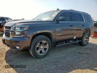 2017 Chevrolet Tahoe LT with VIN 1GNSKBKC5HR180726, listed as a Copart auction lot 57132405 with 116,110 mi miles and Salvage title. Bid and sale history available at DreamBid. Image 1.