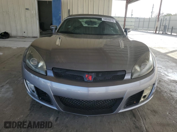 2009 Saturn Sky Red Line z VIN 1G8MG35XX9Y100409, wystawiony jako Copart lot #44640615 z przebiegiem Nie podano mil oraz Szkody całkowita. Historia ofert i sprzedaży dostępna na DreamBid. Obrazek 5.