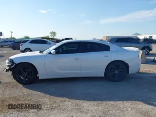 2015 Dodge Charger SXT with VIN 2C3CDXHG8FH730145, listed as a IAAI auction lot 42039927 with 156,135 mi miles and . Bid and sale history available at DreamBid. Image 15.