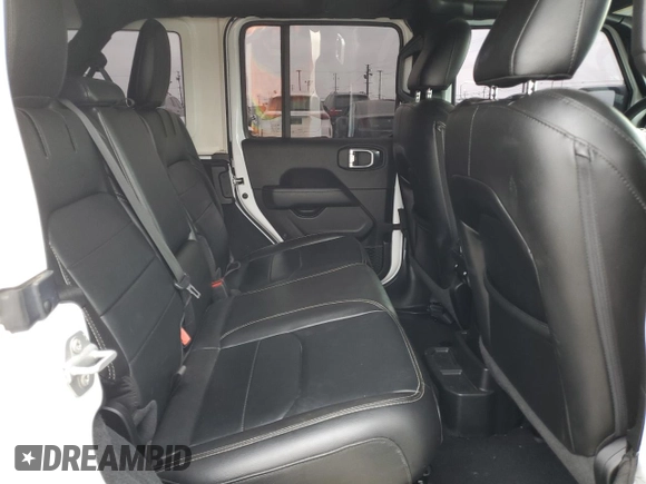 2023 Jeep Wrangler Sahara with VIN 1C4JJXP63PW536694, listed as a Copart auction lot 63409845 with 32,560 mi miles and Salvage title. Bid and sale history available at DreamBid. Image 10.