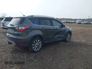 2017 Ford Escape Titanium with VIN 1FMCU9J98HUA49434, listed as a IAAI auction lot 40710866 with 143,850 mi miles. Bid and sale history available at carsss.com. Image 4.