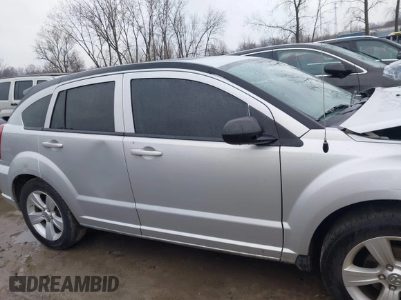 2011 Dodge Caliber Mainstreet with VIN 1B3CB3HA3BD234264, listed as a IAAI auction lot 41998567 with 132,687 mi miles and . Bid and sale history available at DreamBid. Image 14.