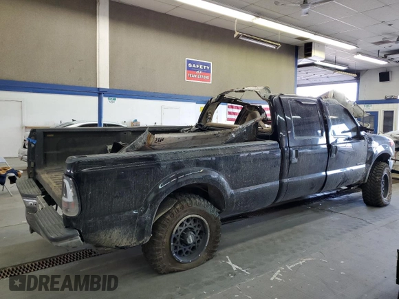 2000 Ford F-350 XL with VIN 1FTSW31F5YEC49047, listed as a Copart auction lot 71756504 with Not Provided miles and Salvage Title. Bid and sale history available at DreamBid. Image 3.