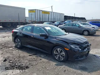 2017 Honda Civic Sedan EX-T with VIN 19XFC1F32HE204861, listed as a IAAI auction lot 42031039 with 61,043 mi miles. Bid and sale history available at carsss.com. Image 1.