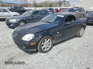 1999 Mercedes-Benz SLK-Class with VIN WDBKK47F2XF102927, listed as a Copart auction lot 50265585 with 184,918 mi miles and Salvage Title. Bid and sale history available at carsss.com. Image 1.